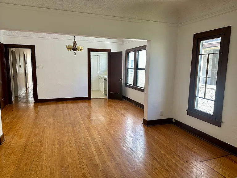 View of Living Room into dining room and Kitchen 2
