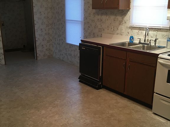 Dining at far end of kitchen