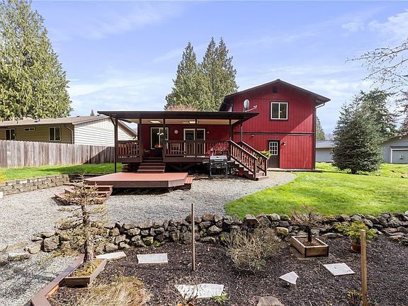 The perfect blend of covered and uncovered backyard entertainment space!