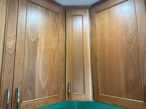 Kitchen Cabinets custom tall with quiet closure.