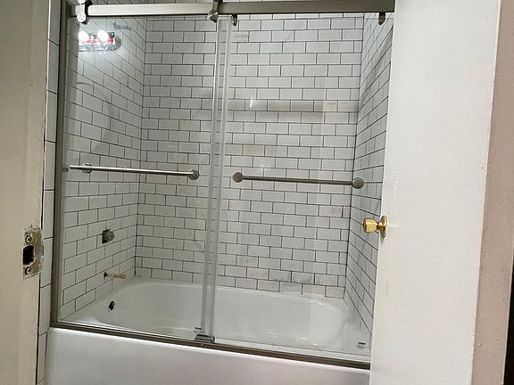 Newly updated, tiled shower and bath