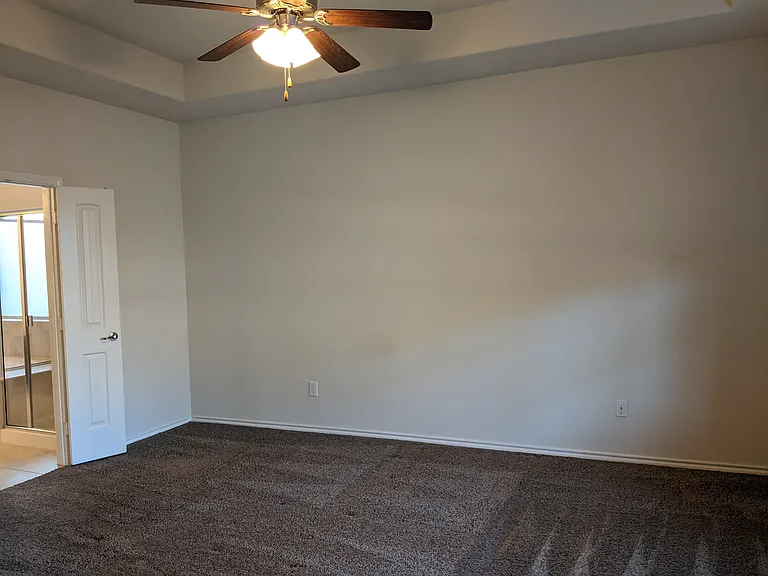 primary bedroom with ensuite bath downstairs