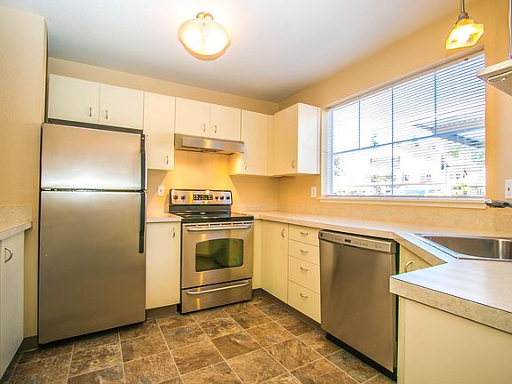 Stainless steel appliances and lots of cabinets. Clean & bright!