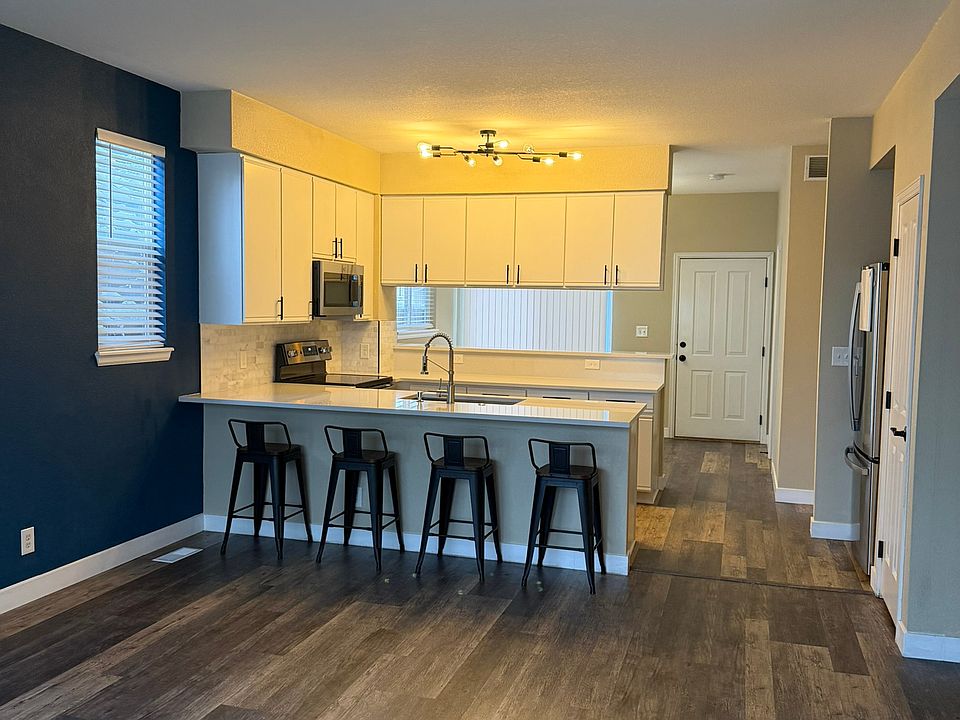 Family room looking to kitchen