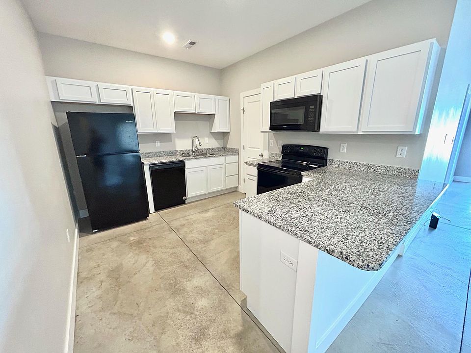 Kitchen complete with granite countertops
