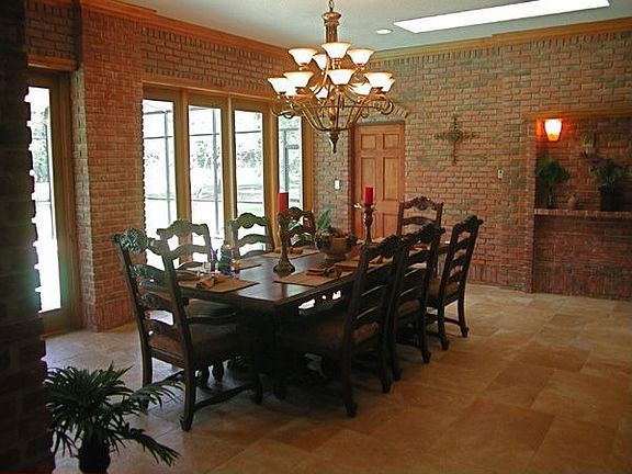 This dining room will accommodate a large group.