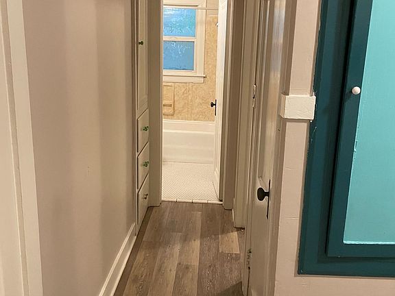 hallway to bedroom and bathroom