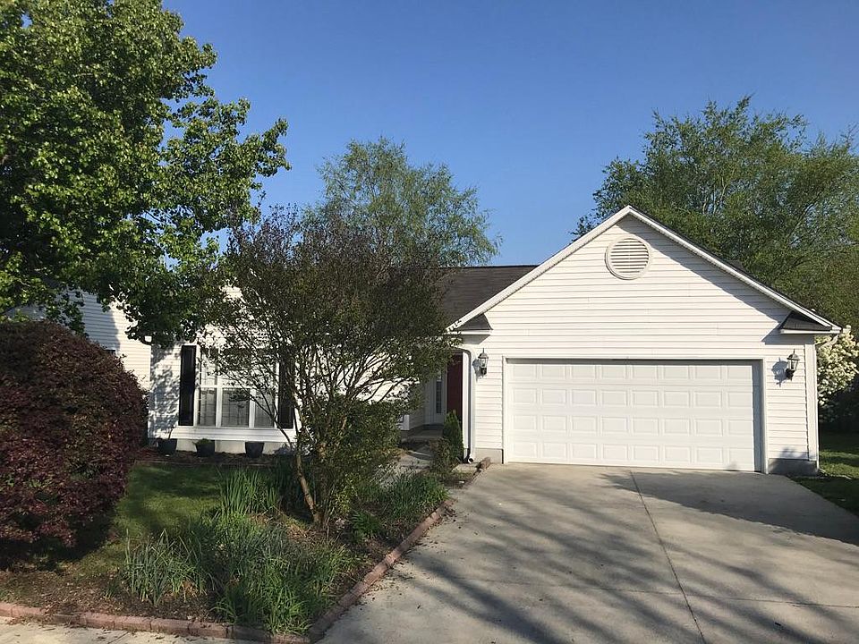 Front view, the neighborhood has complete sidewalks.