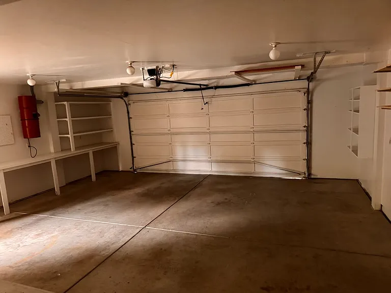 2 car garage with shelves