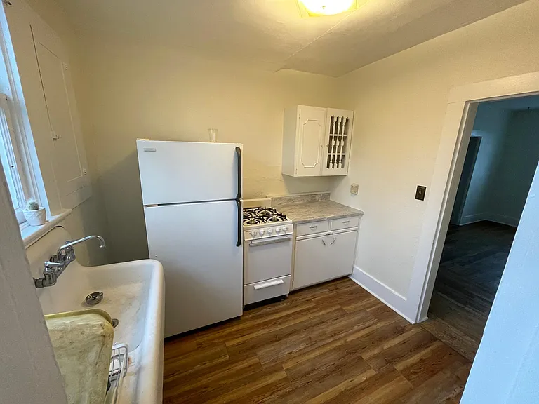 Kitchen with gas stove.
