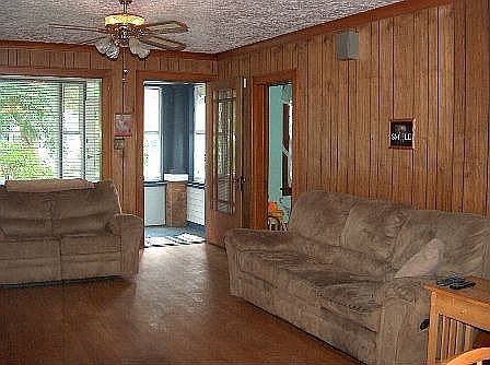 Enclosed porch leads to spacious Living Room