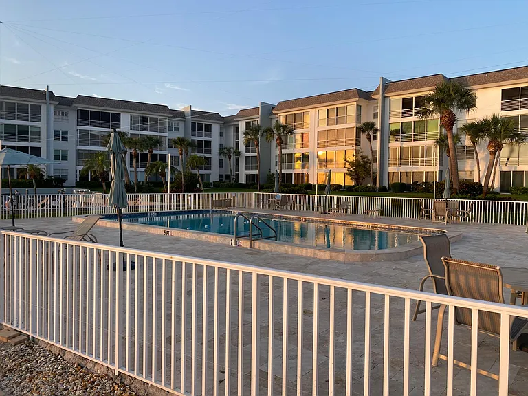 Pool #1. Just steps from units patio door. No steps to take as unit is ground level.
