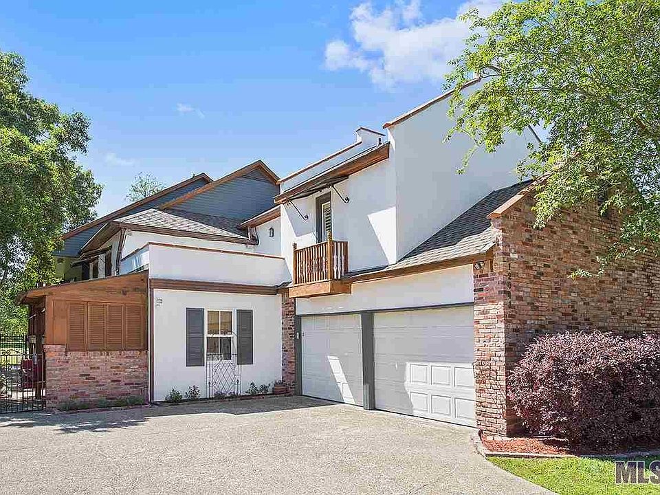 Home Has 2 Car Garage And Outdoor Grilling Area