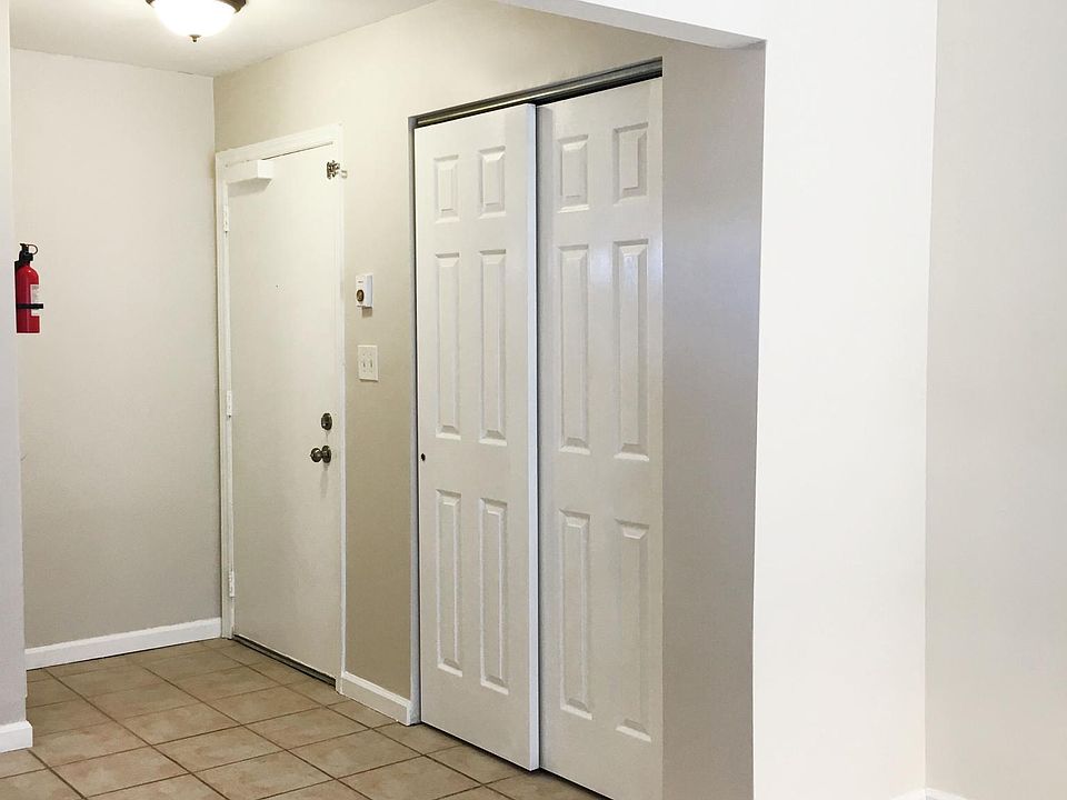 large coat closet in entryway.