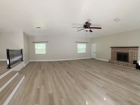 Very spacious living room area.