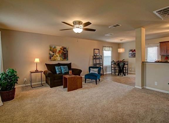 Alternate view of living area, with breakfast area beyond