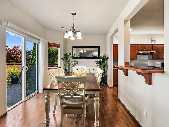 Dining room with 6 chairs. Can seat 8.