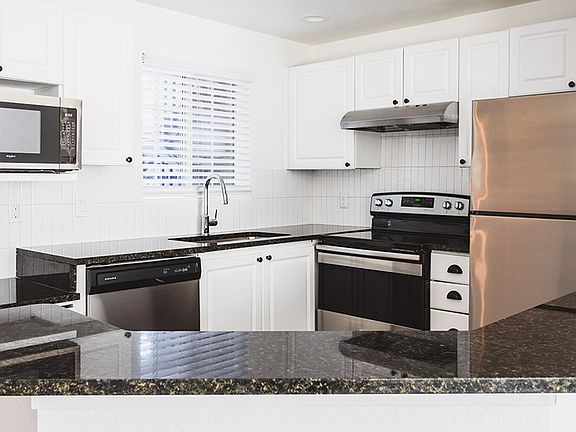 Well appointed and brightly lit open concept kitchen