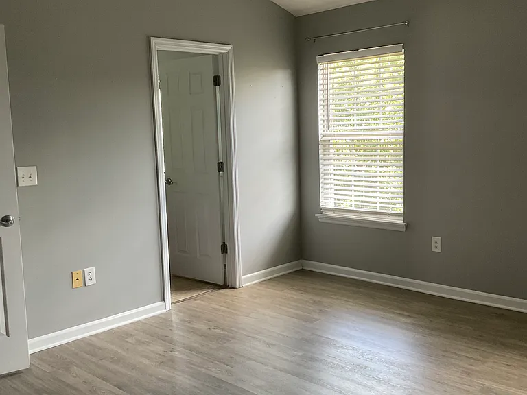 Master bedroom with vaulted ceiling