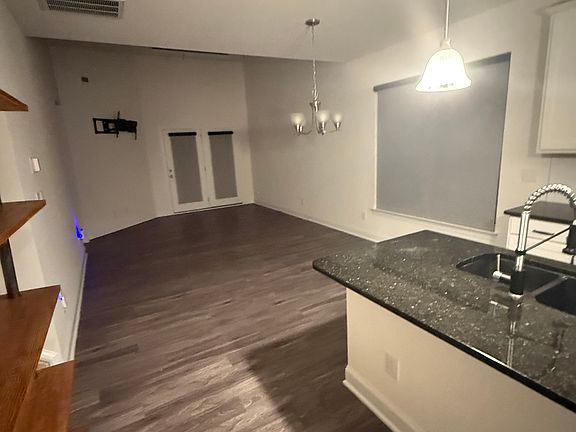 Open living, dining kitchen view from front