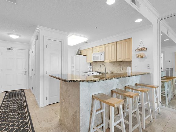 4th image of 8499 Gulf Blvd APT 203