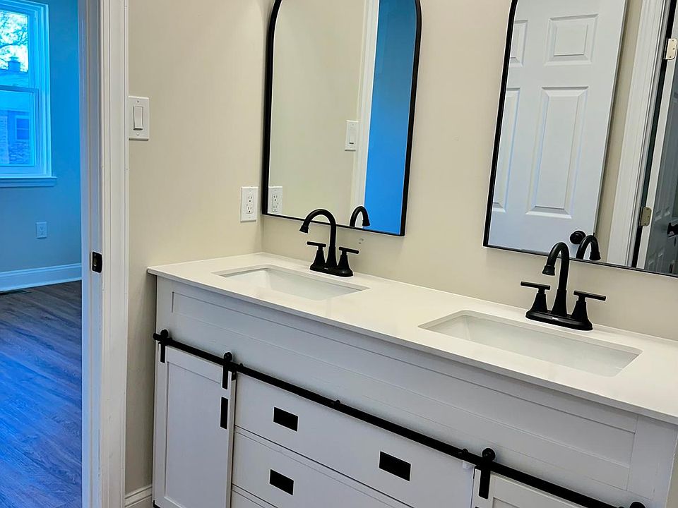 beautiful farmhouse style his and hers sink with upgraded lighting