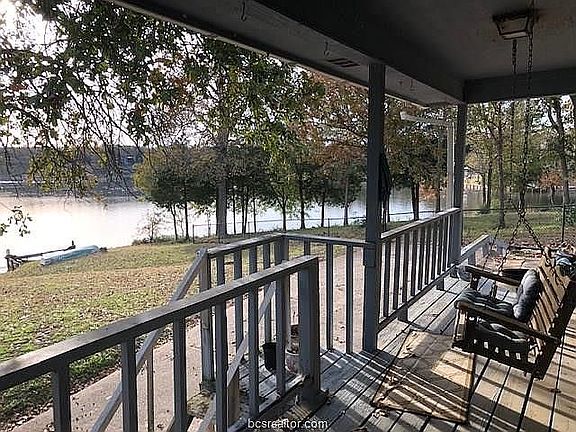 Back deck overlooking lake.