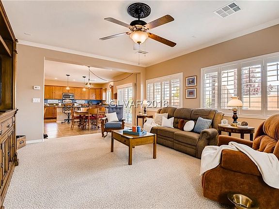 Family Room with Fireplace Overlooks Sparkling, Solar-Heated Pool!