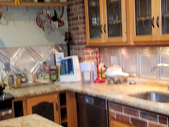 Kitchen sink and glass cabinets