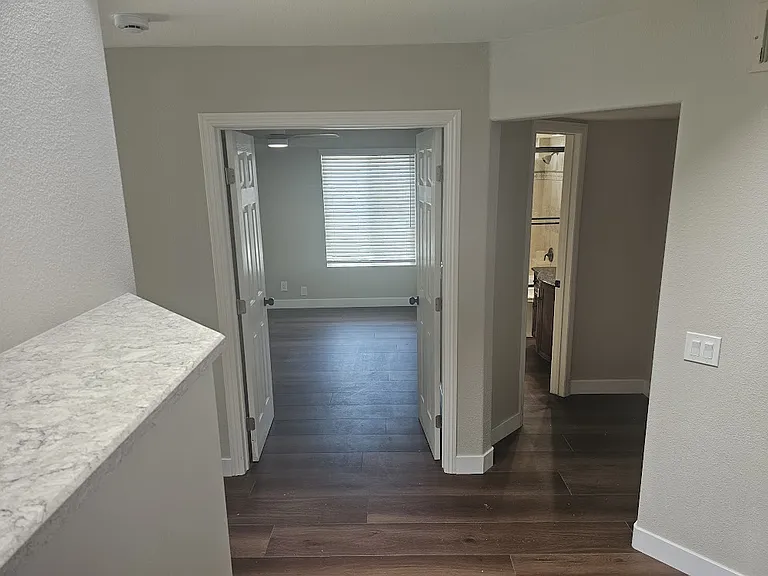 Office, bathroom, and garage entrance.