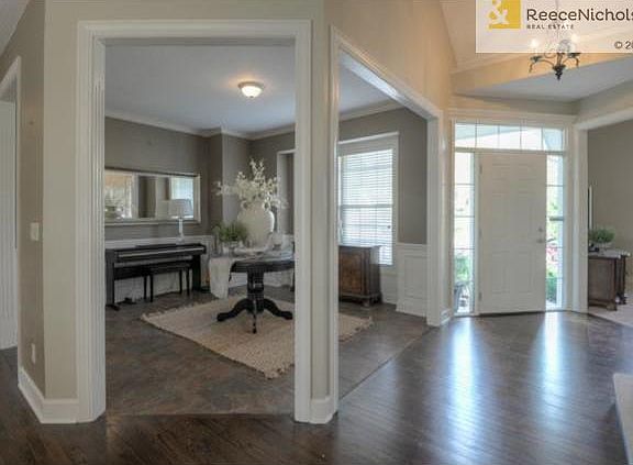 As you enter into the home, you have a formal entry to right and