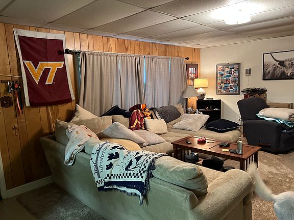 Large living room with picture window, electric heat