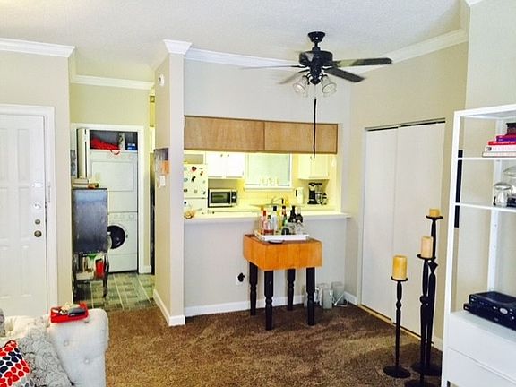 living room looking into Kitchen