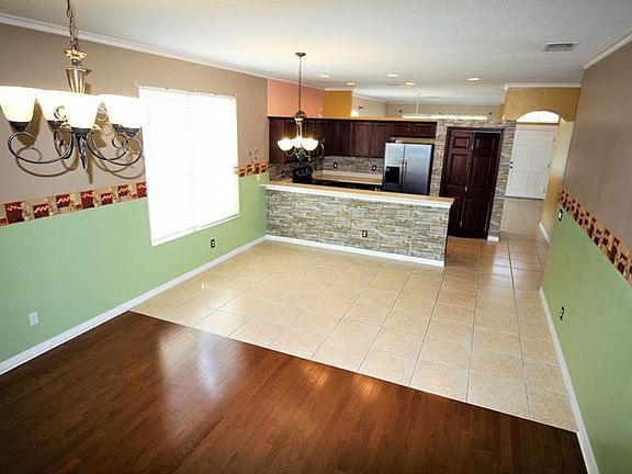 Open Plan Kitchen With Family Dining Area