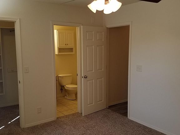 master bedroom and bathroom
