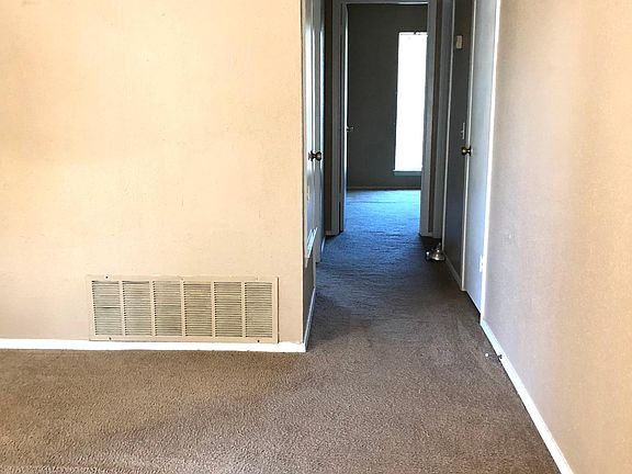 Hallway leading to Bedrooms 2 and 3