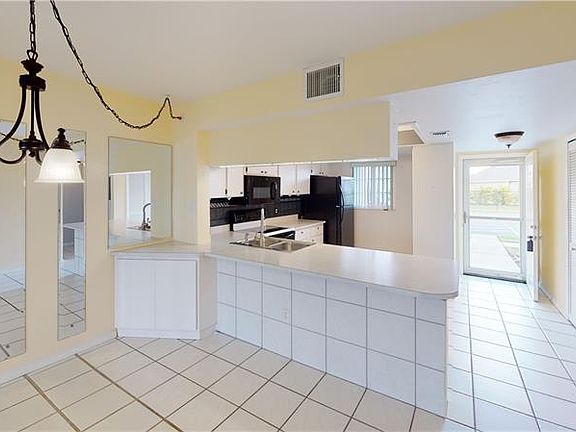 4th image of 3310 Loveland Blvd Unit 201