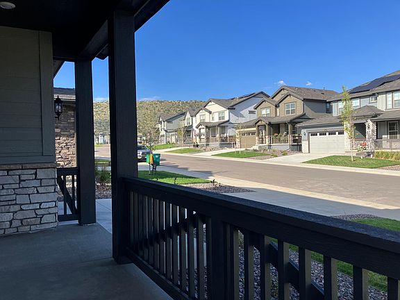 Big covered front porch with mountain view