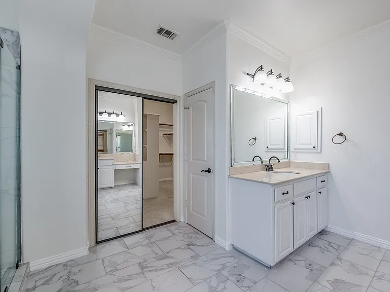 View of 2nd vanity and walk-in closet