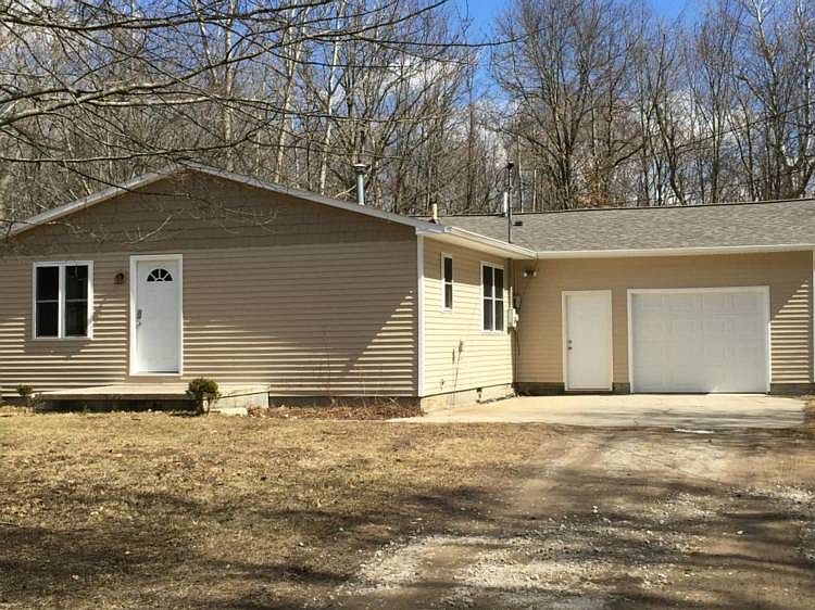 Move right into this newly updated home. It's a three bedroom home with a master bath. Master bedroom has an attached deck. Features new roof, vinyl siding, windows, Hot water heater, flooring, paint, light fixtures and dry-walled garage. All this on a one acre lot in Mt. Haley township.