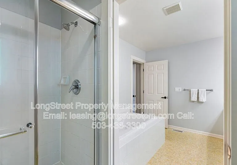 10247 NW Village Heights Dr — Photo 40