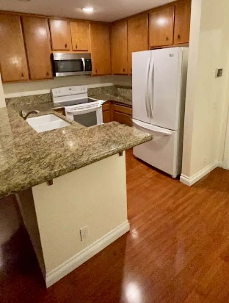 Photo 2 of 13 - 4245 Porte De Merano #110 - San Diego, CA Kitchen - 4245 Porte De Merano #110