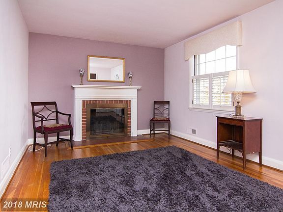 Wood burning fireplace. Wood floors