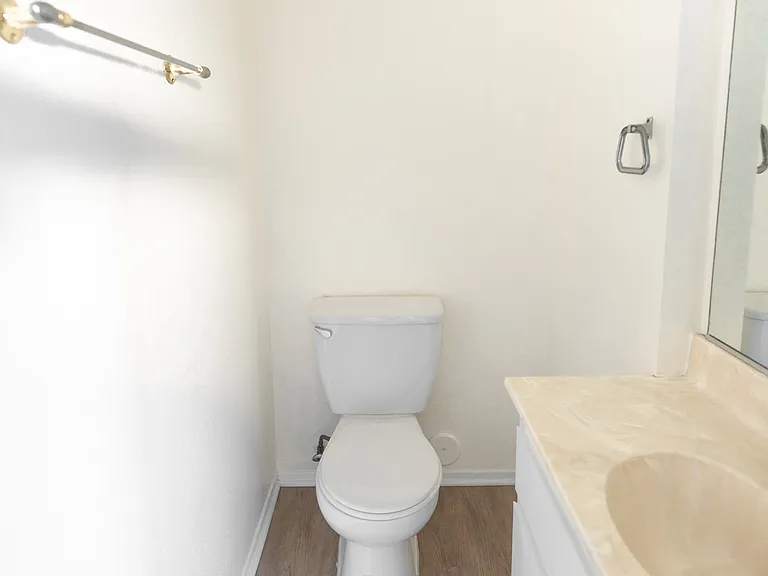 1/2 BATH ON ENTRY LEVEL OFF LIVING ROOM