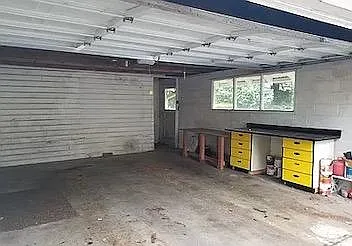 Detached double garage. Garage also includes separate room for storage or chicken house (city allows 5 chickens).