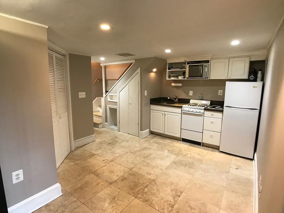 Kitchen and dining area, from the backyard entrance