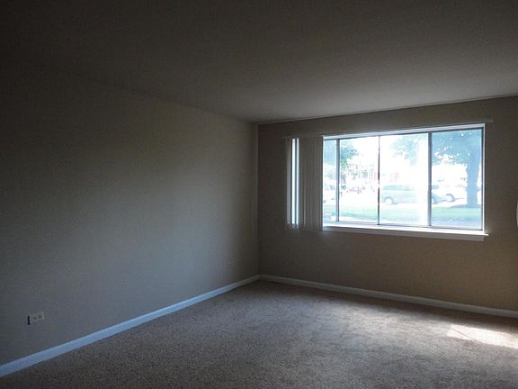 Living room faces Ogden Av