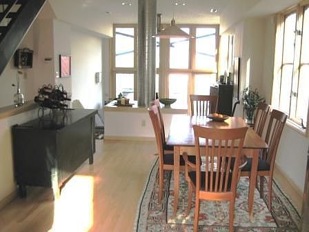 Tons of light, wooded hill along length of unit