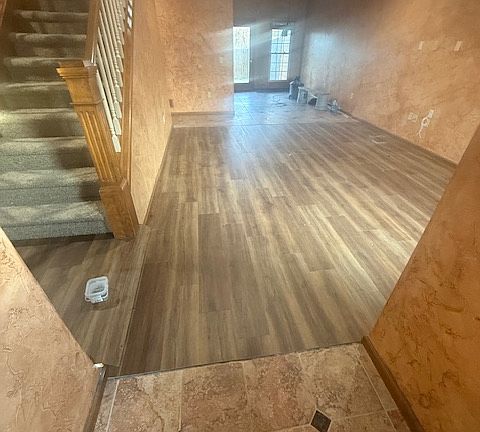 Walking from front door into living room.