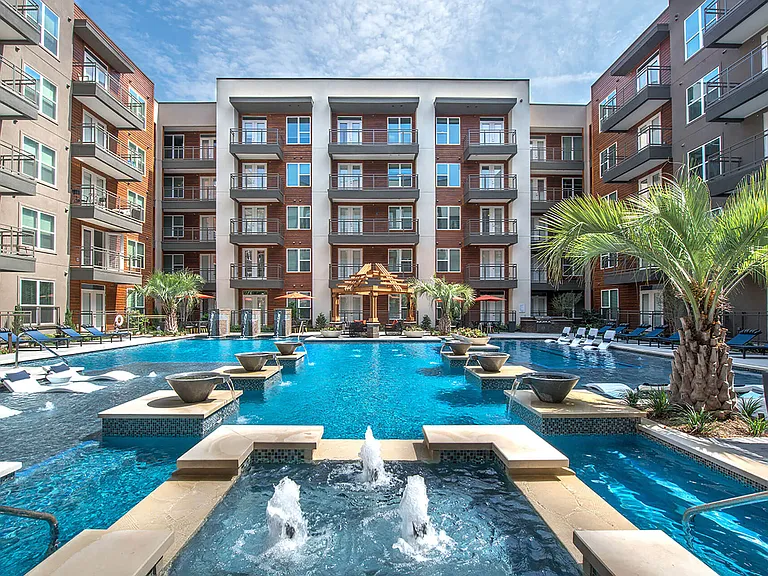 Beautiful water features in our pool area and an outdoor lounge
